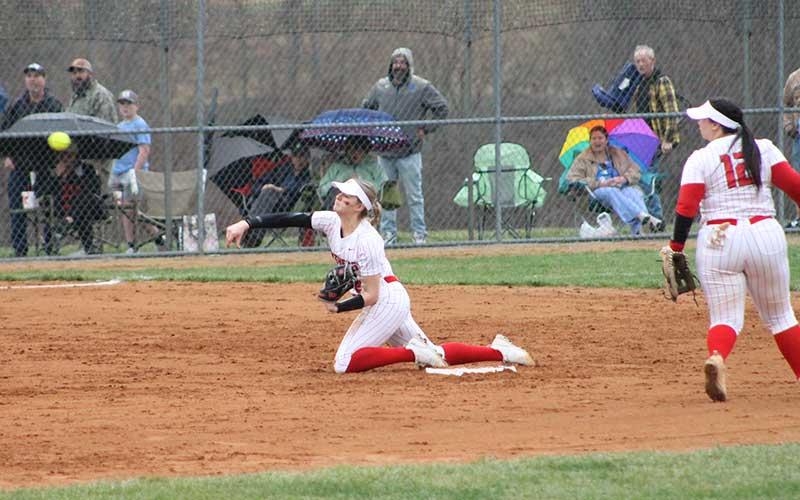 Press photo/Will Woolever - Sophomore shortstop Ashlyn McConnell throws to first after a difficult sliding catch versus T.C. Roberson March 5.