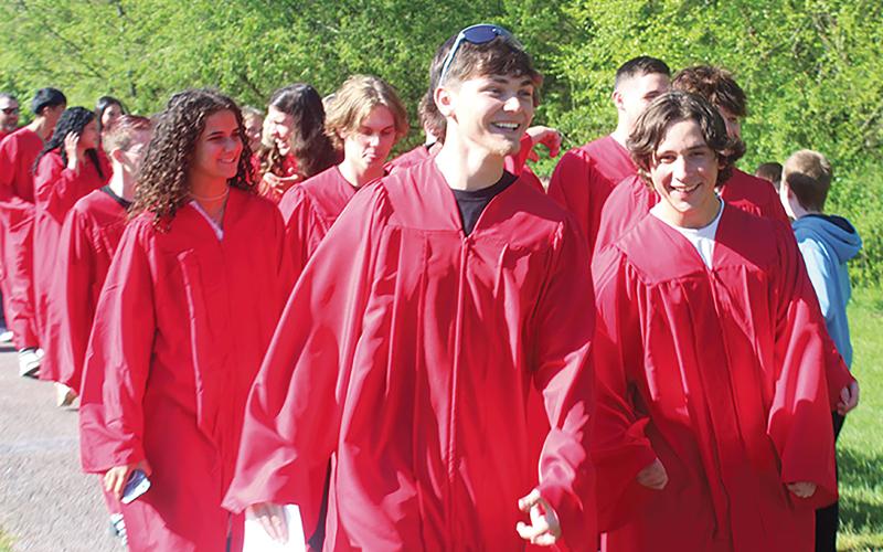 Press photo Thomas Sherrill Franklin High School students participate in the annual Grad Walk at South Macon Elementary School on Monday, April 22.