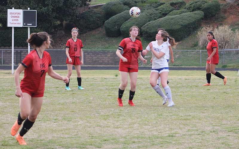 Press photo/Will Woolever - Senior captain Julia Estes wins a header versus Smoky Mountain at the Panther Pit April 1.