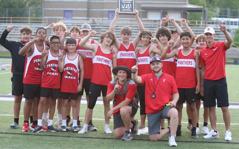 Press photo/Will Woolever.  Macon Middle School boys track and field shows off their Blue Ridge Athletic Conference Championship plaque.