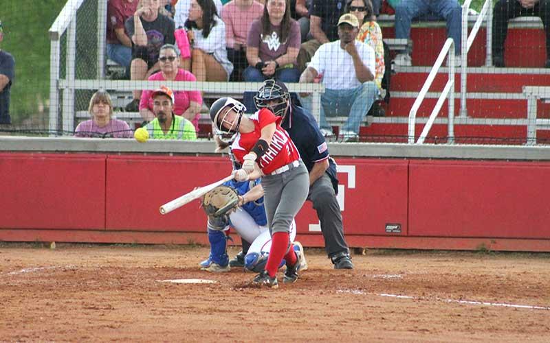 Press photo/Will Woolever - Freshman Anna Stiles makes contact with a pitch versus West Henderson April 30.