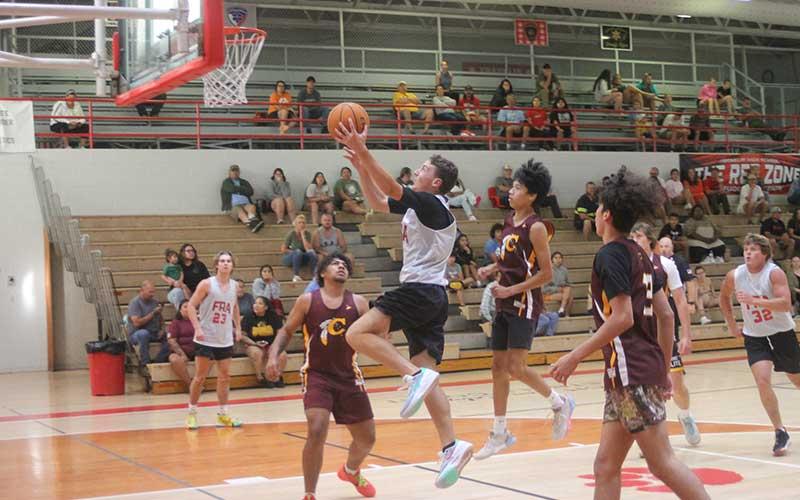 Press photo/Will Woolever - Rising senior Max McClure lays the ball in during Franklin’s varsity summer league scrimmage with Cherokee June 3. The guard will return for his final season as just the third 1,000-point career scorer in Panther men’s history.