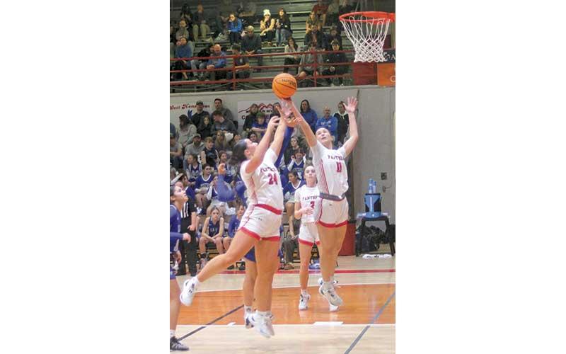 Press file photo - Avery Moffitt (left) and Aubrey Haley fight for a rebound versus Smoky Mountain last January.