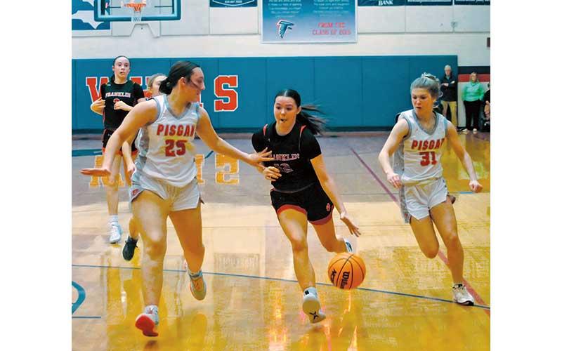 Press file photo - Then-junior Cali Queen brings the ball upcourt versus Pisgah in Franklin’s Mountain Seven Conference Tournament Semifinal last February.
