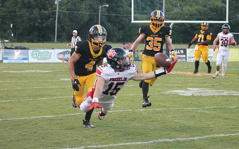 Press photo/Will Woolever - Sophomore Damion Bowles attempts to reel in a pass at Murphy Aug. 23.