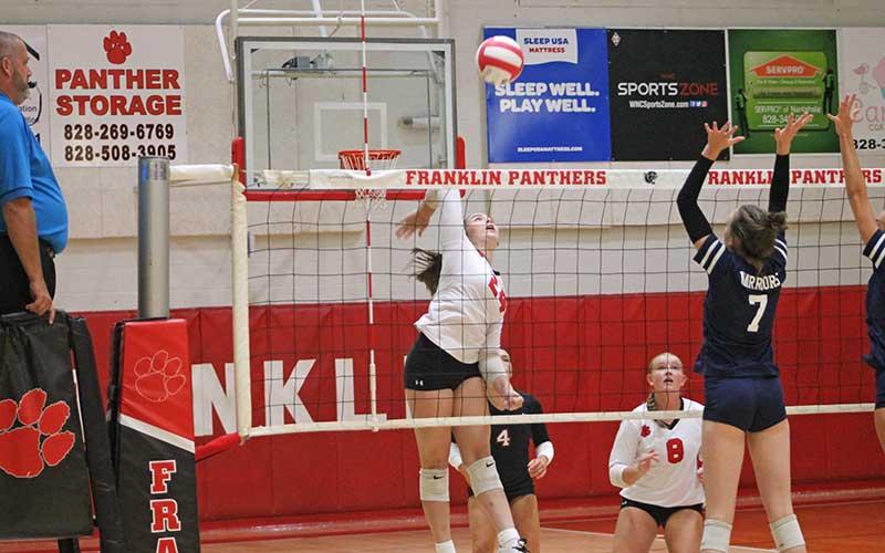 Press photo/Will Woolever - Freshman Ella Raby prepares to spike a ball versus West Oak Aug. 21.