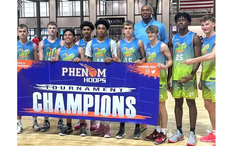 Press photo/Will Woolever - Panther hoops legend Lee Scruggs (back) is pictured with members of his Team Swish amateur travel team after winning the Phenom Hoops Tournament in Rock Hill, South Carolina, this spring.