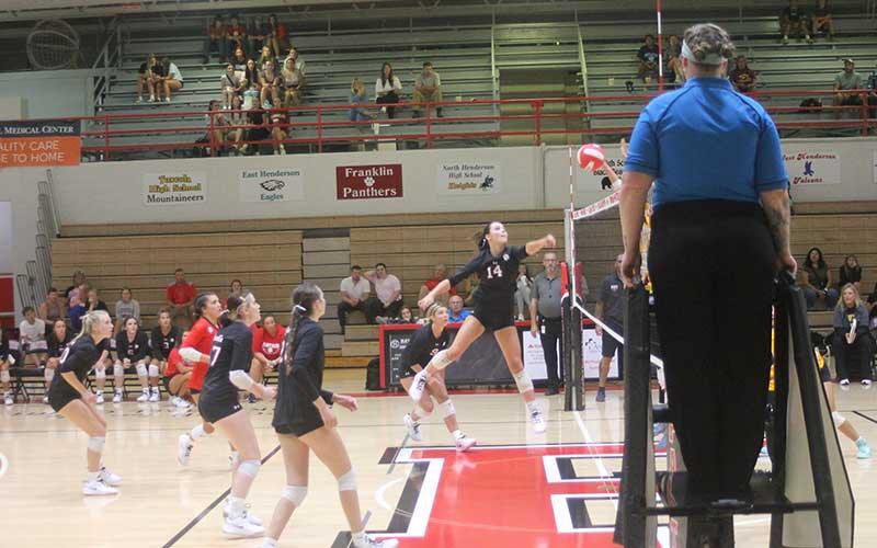 Press photo/Will Woolever - Senior Cali Queen lifts a ball over the net in a home scrimmage versus Cherokee Aug. 8.