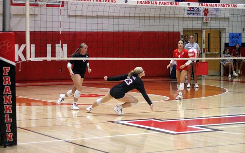 Press photo/Will Woolever - Sophomore Danni Ledford receives a difficult pass versus North Henderson Sept. 3.