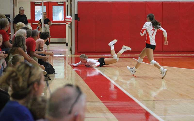 Press photo/Will Woolever - Sophomore Anna Stiles makes an impressive diving save versus West Henderson Sept. 10.