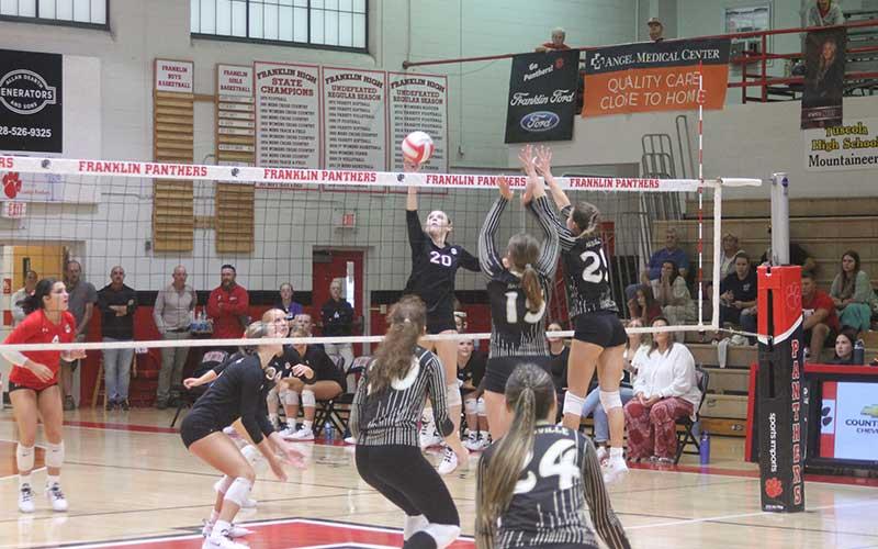 Press photo/Will Woolever - Senior Kyrah Bowles lifts a ball over the net versus Hayesville Sept. 16.