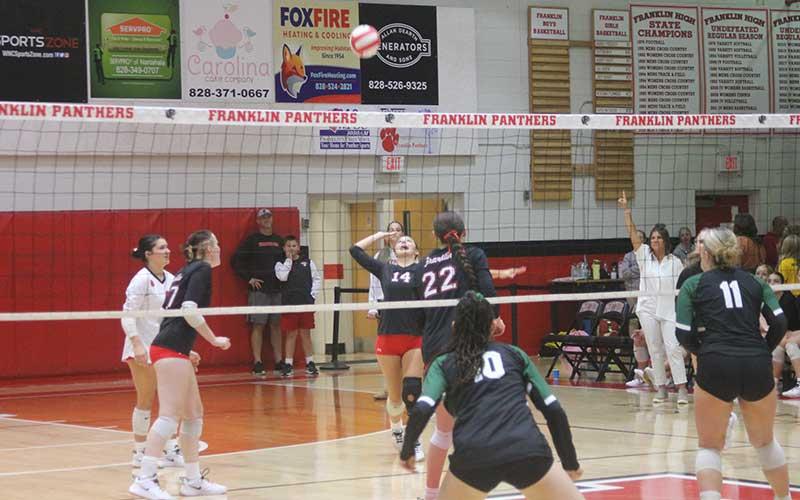 Press photo/Will Woolever - Senior Cali Queen prepares to strike the ball versus East Henderson on Tom Raby Court Sept. 17. Queen returned for one final match before undergoing major surgery after injuring her knee versus Murphy Aug. 15.