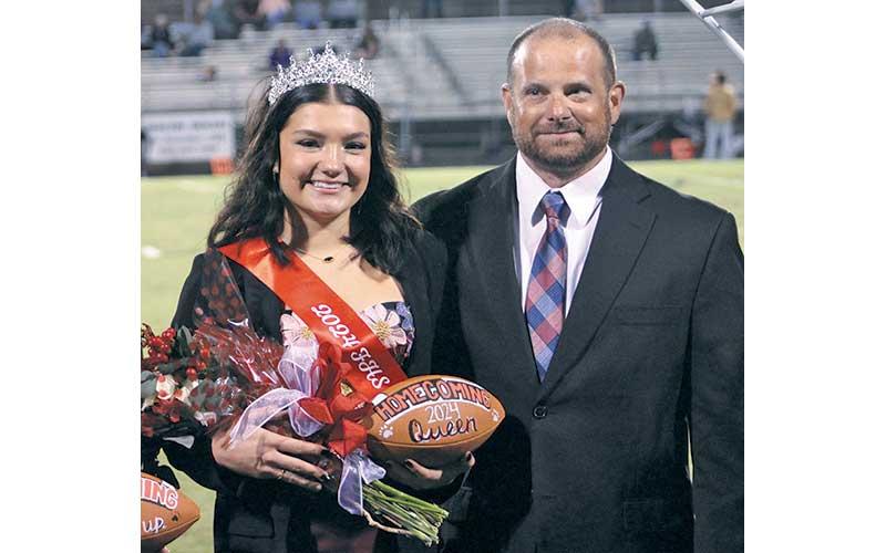 Press photo/Will Woolever - FHS Homecoming Queen McKayla Sanders escorted by her father, Skip.