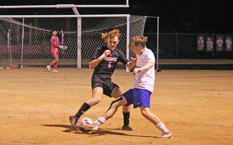 Press photo/Will Woolever - Senior defender Alex Trivett fights for possession versus Smoky Mountain at the Panther Pit Oct. 23.