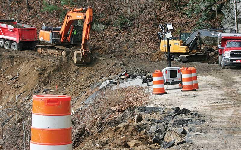 Photo/Ryan Hanchett - A crew from Bryson Grading and Paving has started the work to repair NC 106 and hope to have the road ready for travel sometime in January.