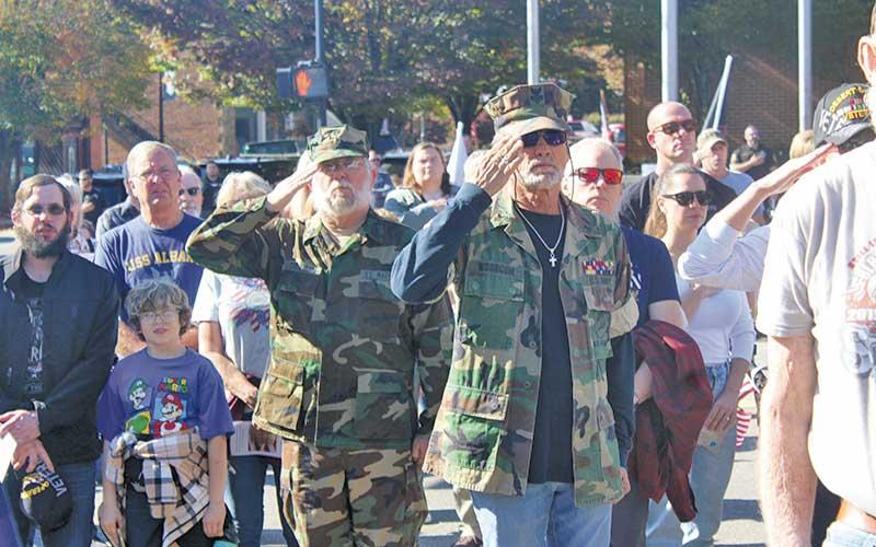 Press photo/Thomas Sherrill - Veterans and local residents gathered at the gazebo in downtown Franklin for the 2024 Veterans Day ceremony following the parade.