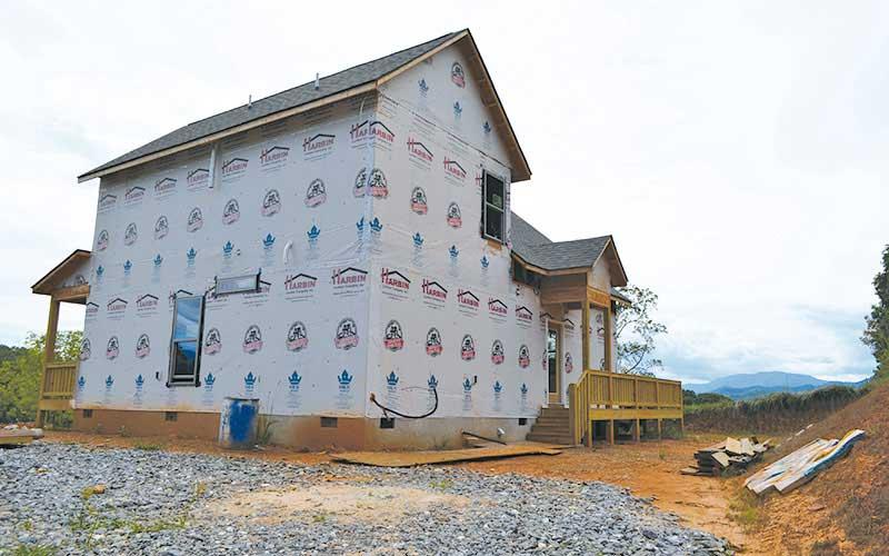 Press file photo - A house under construction in the Scenic Ridge neighborhood earlier this fall. A recent housing study showed a need for more homes priced between $195,468-$289,200 to be more in line with local household incomes.