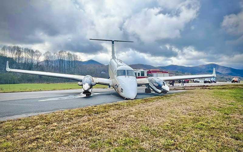 Photos/Franklin Fire &amp; Rescue - After landing at the Macon County Airport, the pilot of the twin-turboprop reported the plane was not responding to controls; the nose gear broke off as the plane veered off the runway.