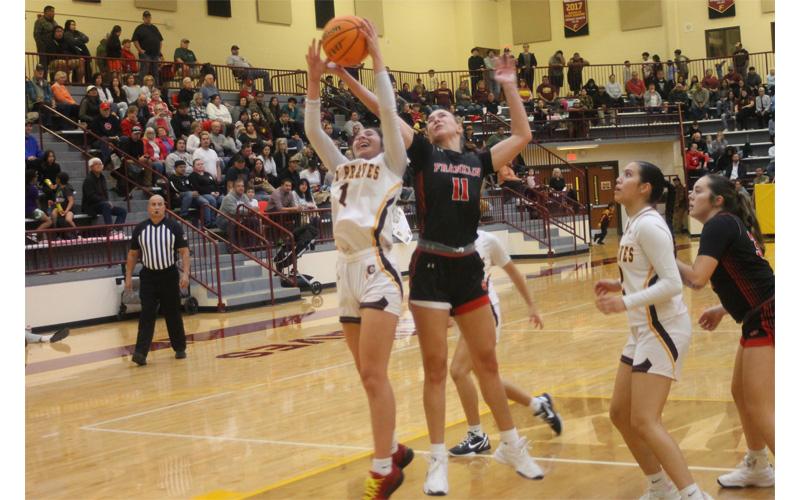 Senior Aubrey Haley fights for a rebound at Cherokee Nov. 26. (Press file photo)