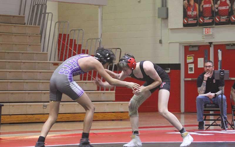 Press file photo - Then-freshman Branch Browning hand-fights with a wrestler from North Henderson on Tom Raby Court last year.