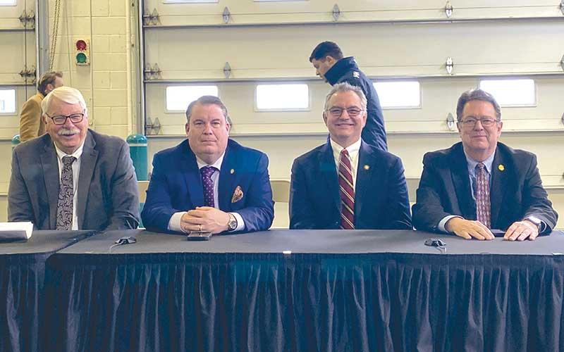 Photo submitted - From left, N.C. Agriculture Commissioner Steve Troxler, N.C. House Majority Leader Rep. Brendan Jones (R-Tabor City), N.C. Rep. Karl Gillespie (R-Franklin) and N.C. Sen. Kevin Corbin (R-Franklin), at a presidential roundtable at the Asheville Regional Airport on Friday, Jan. 24.