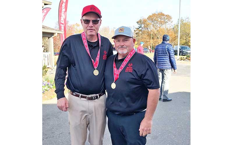 Photo submitted - Hedrick (left) and Hall show off their state gold medals from the SONC Fall Tournament at Charles T. Myers Golf Course in Charlotte last November.