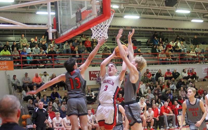 Press photo/Will Woolever - Senior Max McClure attempts a contested layup vs. Pisgah Jan. 3.