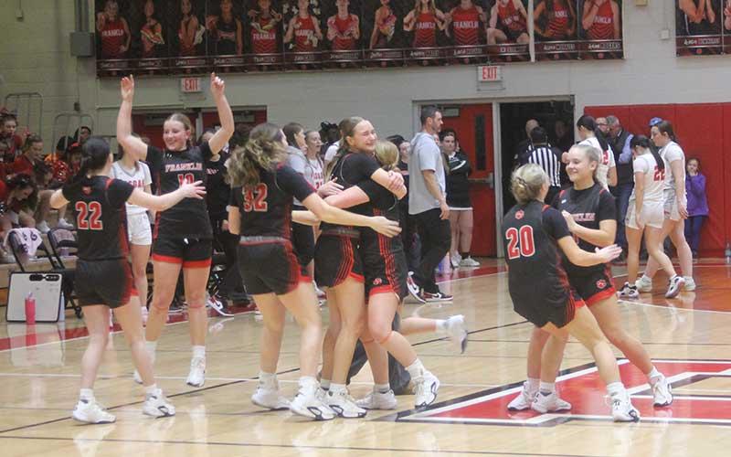 Press photo/Will Woolever - Panther varsity women’s hoops celebrate on Tom Raby Court after upsetting Pisgah in the Mountain Seven Conference Final Feb. 20.