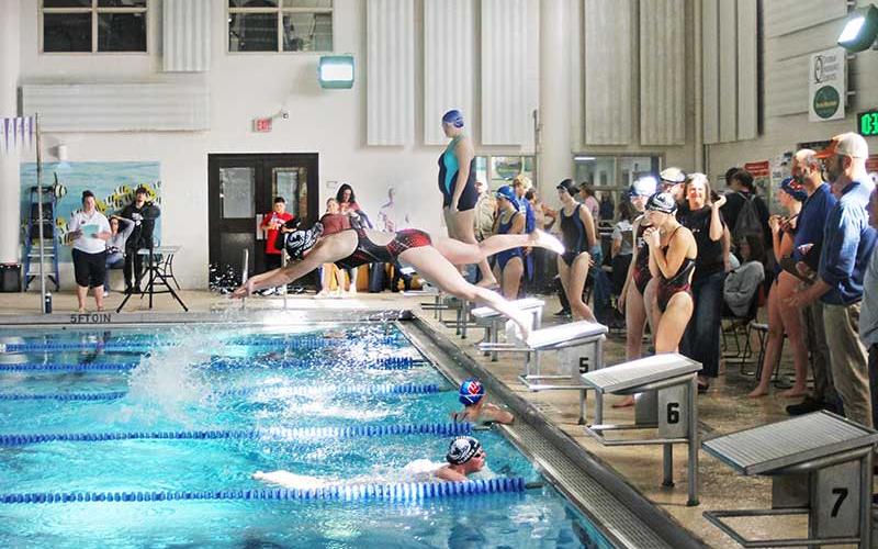 Press file photo - Sophomore Kenna Keyworth dives off the block in the girls 400-yard freestyle relay during the Mountain Seven Conference Championships at the Waynesville Aquatic Center Jan. 18.
