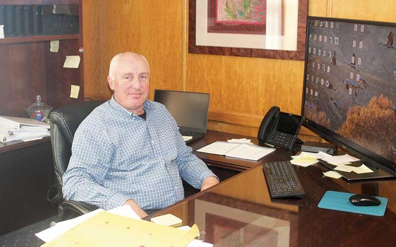 Press photo/Thomas Sherrill - Macon County Manager Warren Cabe in his office.
