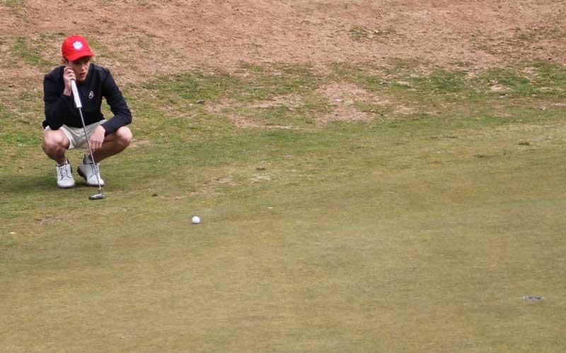 Press photo/Will Woolever - Junior Tanner Jones plots a path to the first hole (bottom right) at the Franklin Golf Course Feb. 27.