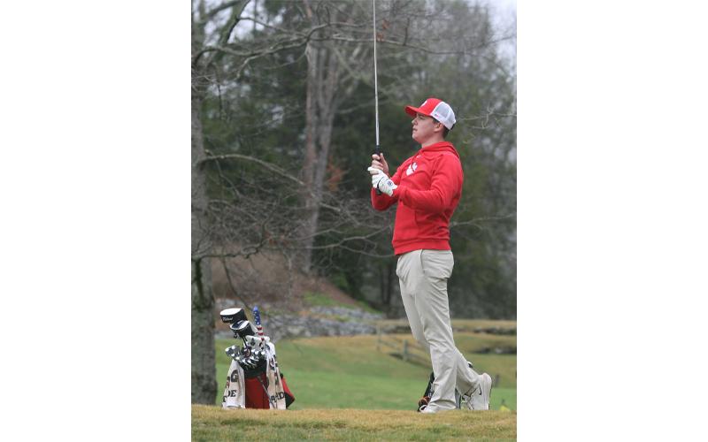 Press photo/Will Woolever. Junior Braylen Dulicai tracks his ball’s flight at Highlands Falls Country Club March 24.