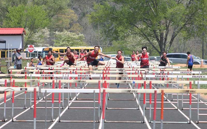 Press photo/Will Woolever - An all-Panther heat competes in the men’s 110-meter hurdles at Franklin’s first home track meet in six years April 19. From left are Dylan Monzon, Josiah Sheldon, Chad Engel, Braylen Dezarn and Jonas Phillips.