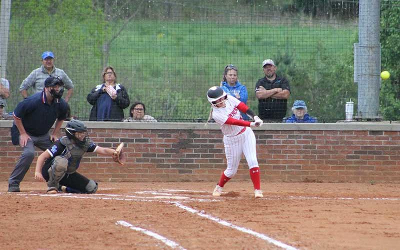 Press photo/Will Woolever - Senior Jozy Dehart knocks a second-inning single in Franklin’s Senior Night game versus Smoky Mountain April 24.
