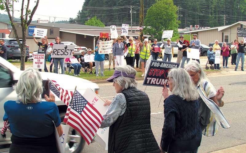 Press photo/Christian Ray - May Day protesters along East Main Street.