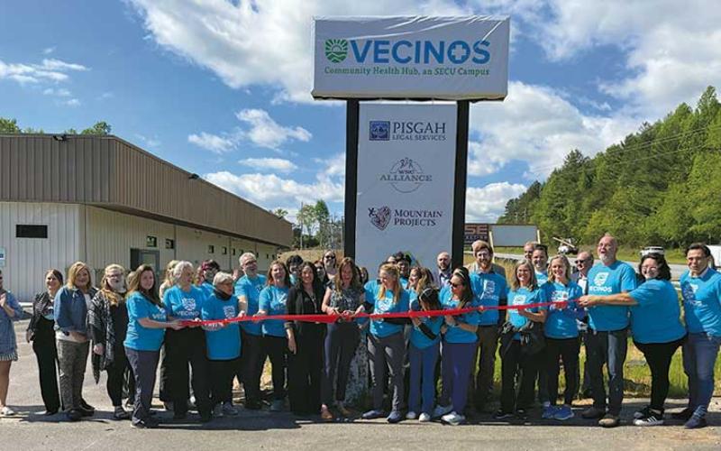 Press photo/Christian Ray - Vecinos staff and board members gathered ono May 6 for a ribbon cutting at the new Community Health Hub on the Highway 441 Bypass in Franklin.