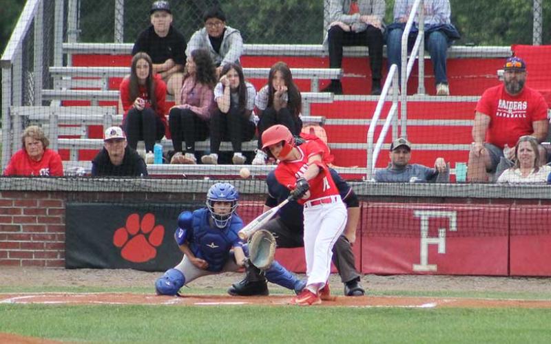 Press photo/Will Woolever - Eighth-grader Sam Moore makes contact with a pitch in the Blue Ridge Athletic Conference Championship at McConnell Field May 7.