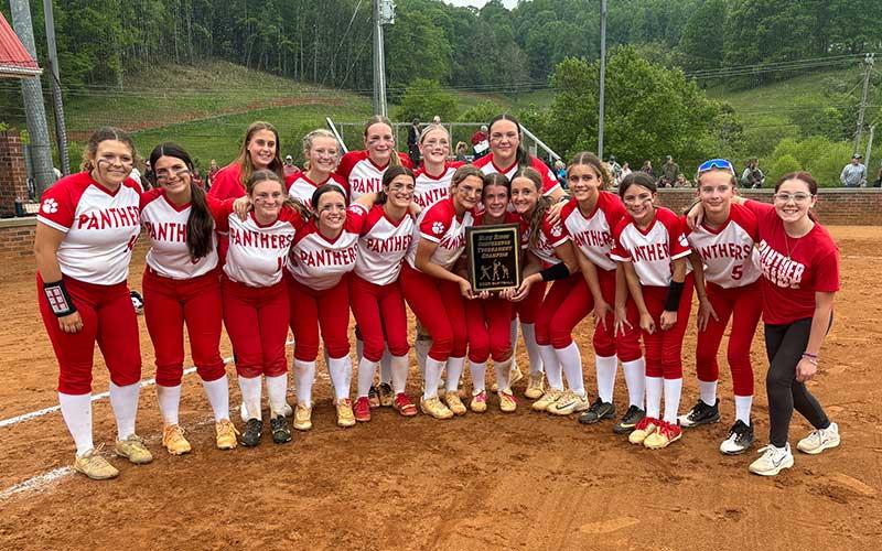 Press photo/Will Woolever - Macon Middle School softball is pictured with their fourth straight Blue Ridge Athletic Conference title plaque after a thrilling 1-0 home win over Smoky Mountain May 7. Pictured are players Palmer Tallent, Emmy Moffitt, Neelley Vinson, Kyleigh Winchester, Chloe Lambert, Ellie Nunley, Karlie Beck, Molly Moeller, Tatum Carrion, Kinley Young, Alyssa Awtrey, Payton Houston, Eva Holland, Payton Manos and Arianna Green; and managers IIaeh Ezechel and Blakeleigh Garrett.