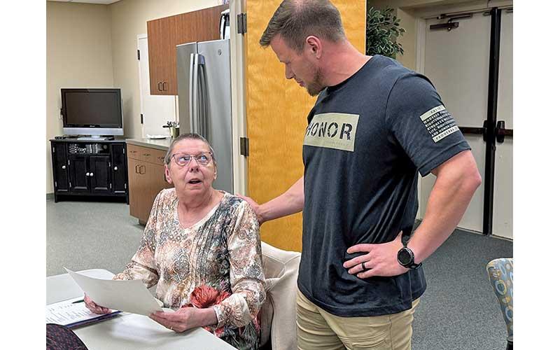 Press photo/Mia Overton - Franklin Town Council member Robbie Tompa presents Connie Grubermann a certificate of appreciation for her service on the TDA board, including serving as chair since 2018.