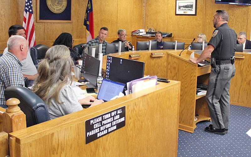 Press photo/Shelby Powell - Sheriff Brent Holbrooks addresses the Macon County Board of Commissioners