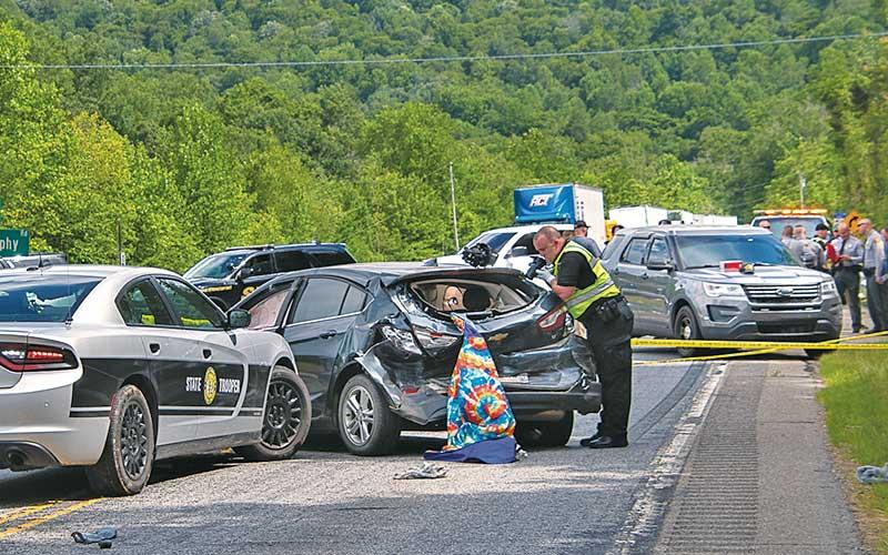 Photo/Bob Scott Law - enforcement from multiple agencies converged on Highway 64 in Macon County as they stopped Kelvin Simmons, who is charged in the shooting death of a detention officer in Cherokee County. Simmons led officers on a chase through Clay County into Macon County Monday afternoon.