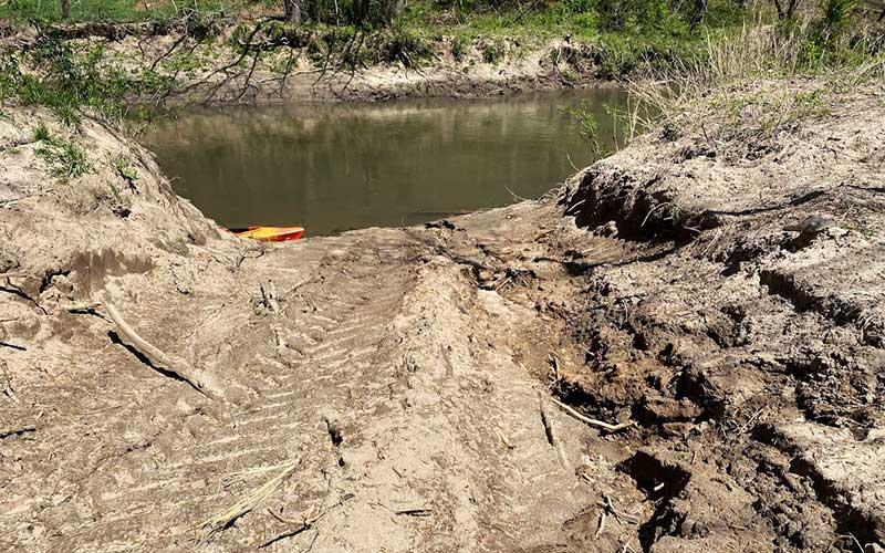Photo submitted - An ingress/egress site, used by contractors to move equipment into and out of the river, yet to be remediated as of June 22, shows signs of erosion.