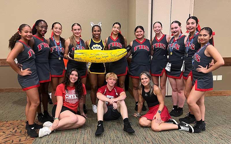 Photo courtesy of Lynn Baker - Panther cheer and dance shows of their Top Banana award at the Universal Cheerleaders’ Association team camp in Concord recently.