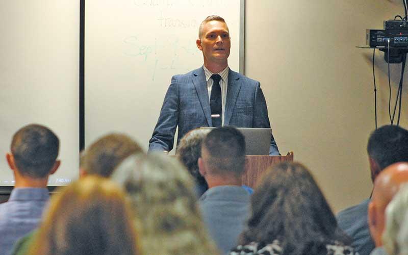 Press photo/Shelby Powell - Macon County Schools Superintendent Josh Lynch speaks at the Franklin Chamber of Commerce’s Eggs &amp; Issues Business Forum on Sept. 5.