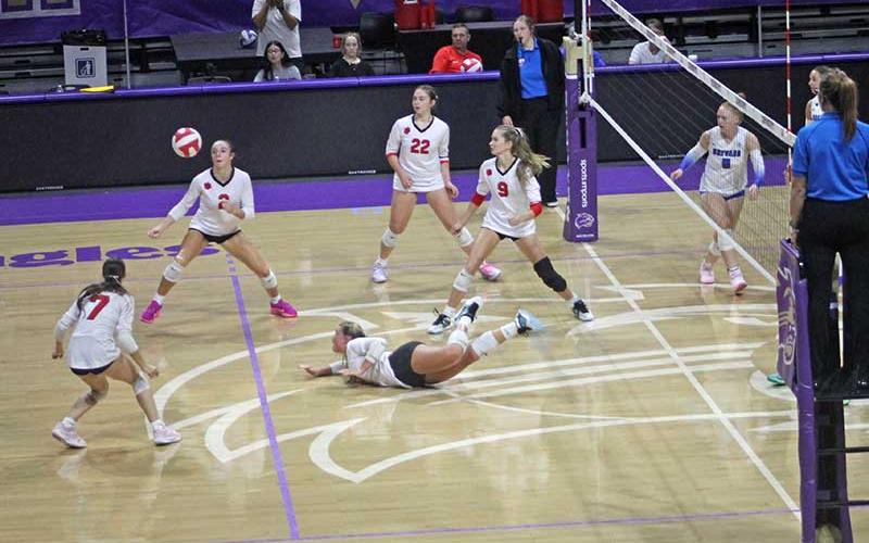 Press photo/Will Woolever - Panther volleyball tries to keep a ball in the air after a difficult diving save from Bristol Brooks (foreground) versus Brevard at WCU Sept. 18.
