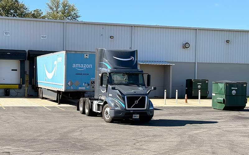 Press photo/Mia Overton - An Amazon delivery truck parked at the Franklin facility in the Macon County Industrial Park. The company has been leasing the space from Tek-Tone but plans to close the delivery hub before the end of the year as a new facility opens in Hayesville.