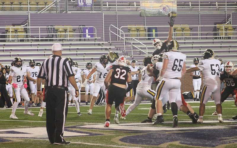 Press photo/Will Woolever - Sophomore Daiveon Hall tries to bat down a pass in Franklin’s homecoming game versus Tuscola Oct. 3.