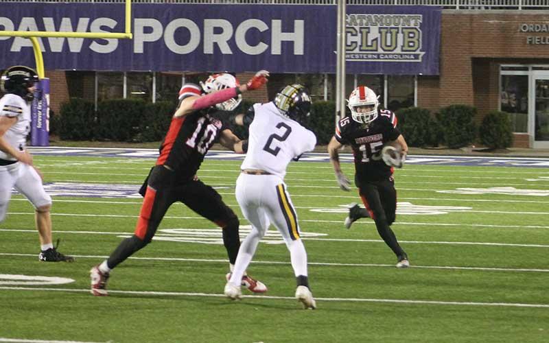 Junior Damion Bowles returns a punt versus Tuscola at Western Carolina University Oct. 3. (Press file photo)