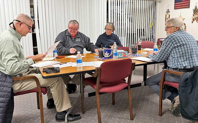 Press photo/Mia Overton - The Macon County Board of Elections met Monday morning to tally the provisional ballots cast in the municipal elections. Pictured: Chair John Vanhook, Gary Dills, Kathy Tinsley and Paul Niskanen.