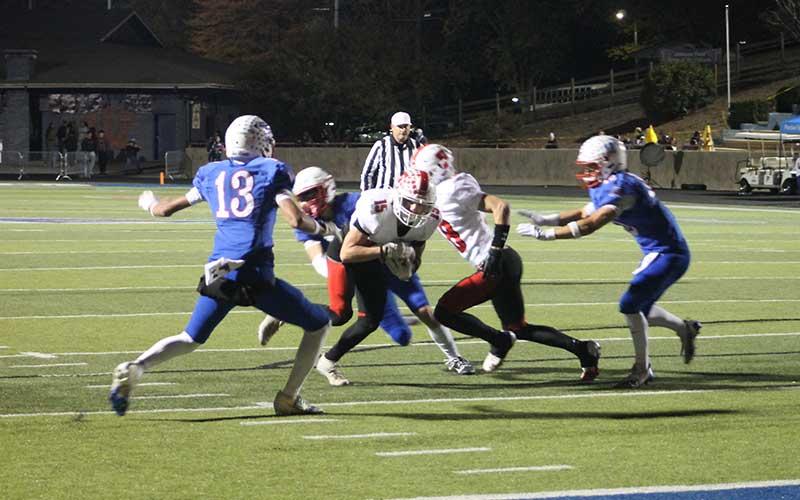 Press photo/Will Woolever - Junior Damion Bowles nears the end zone in Franklin’s regular season-finale win at West Henderson on Halloween.
